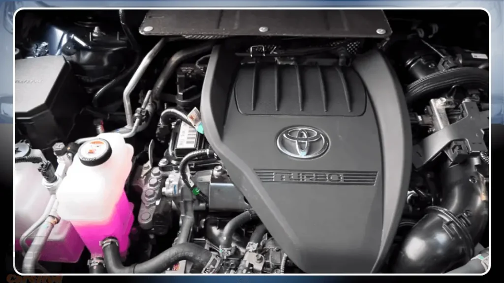 Close-up of the 2024 Toyota Highlander Hybrid engine, showcasing its hybrid powertrain.