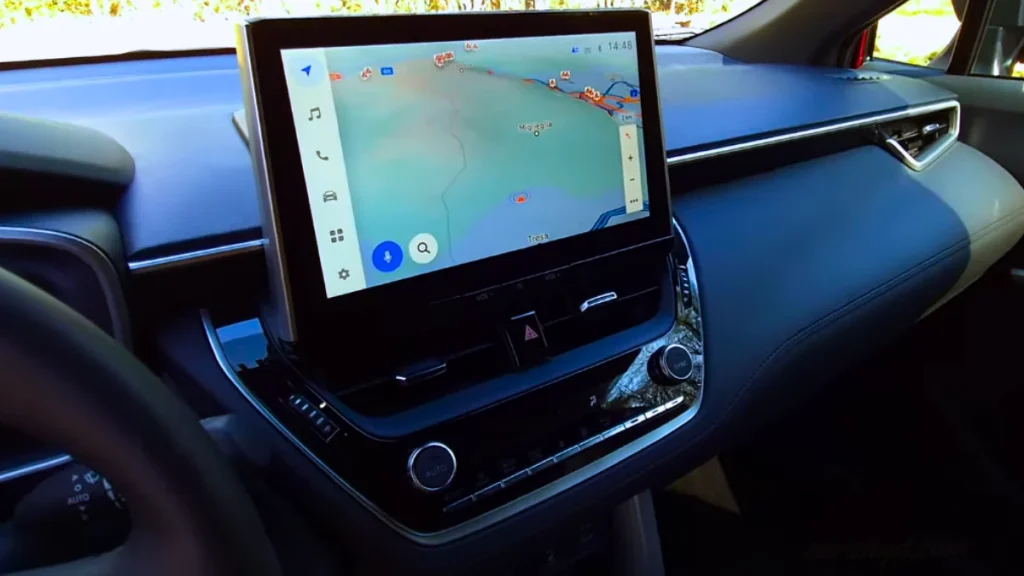 2025 Toyota Corolla Cross Hybrid center touchscreen with infotainment display and climate controls
