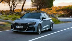 The 2026 Audi RS3 being driven through city streets