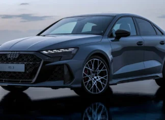 2026 Audi RS3 Review: The new America’s Favorite Compact Sedan Front three-quarter view of the refreshed 2026 Audi RS3 luxury performance compact sedan speeding on a track, highlighting its aggressive new stance.