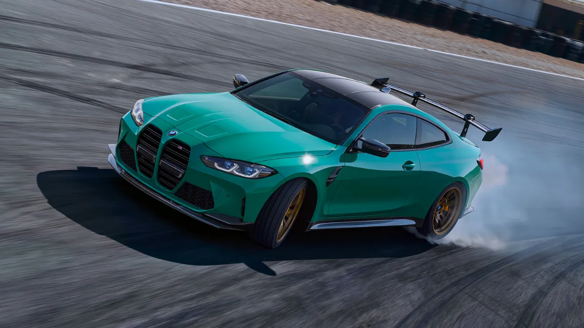 BMW M2 high performance sports car cornering on race track