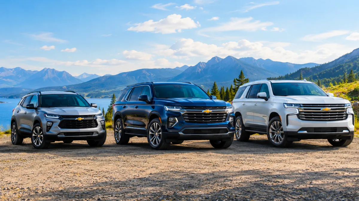 Chevrolet SUV facing a mountain lake